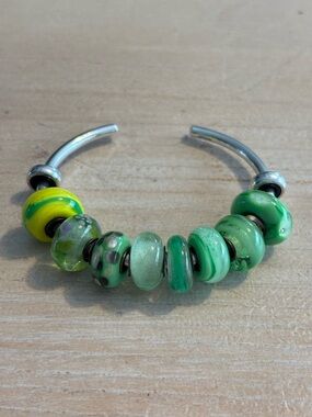 Artisan made glass beads with 925 silver core